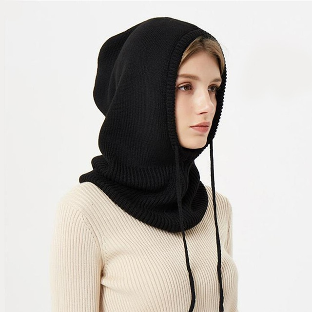 Belro cashmere winter knitted hat in cozy, soft beige with ribbed design, perfect for cold weather accessories.
