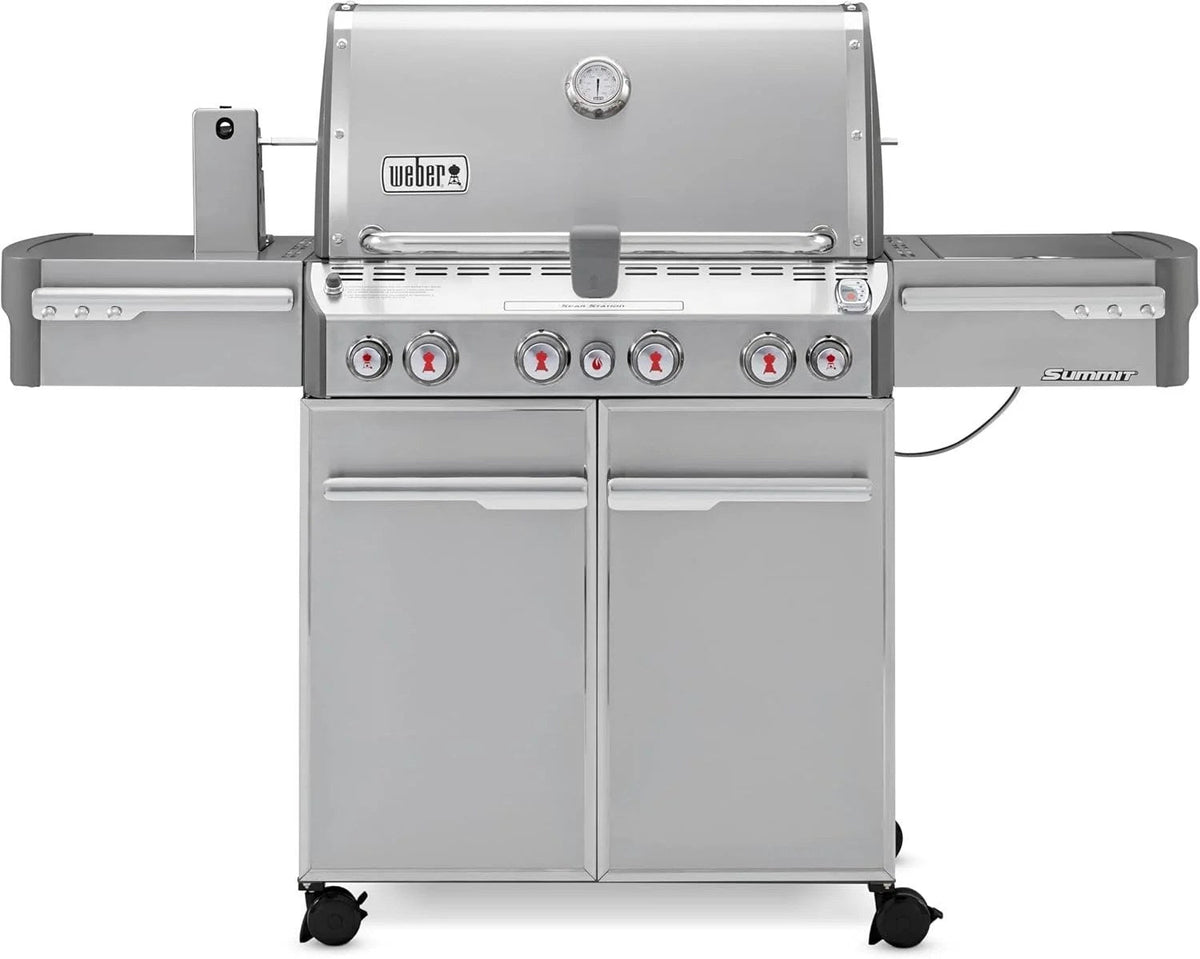 Casavibeo Weber Summit S-470 gas grill with stainless steel lid, four burners, side shelves, and control knobs for outdoor cooking