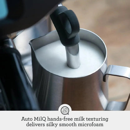 Casavibeo Breville Barista Touch espresso machine with stainless steel finish, digital display, and built-in milk frother.