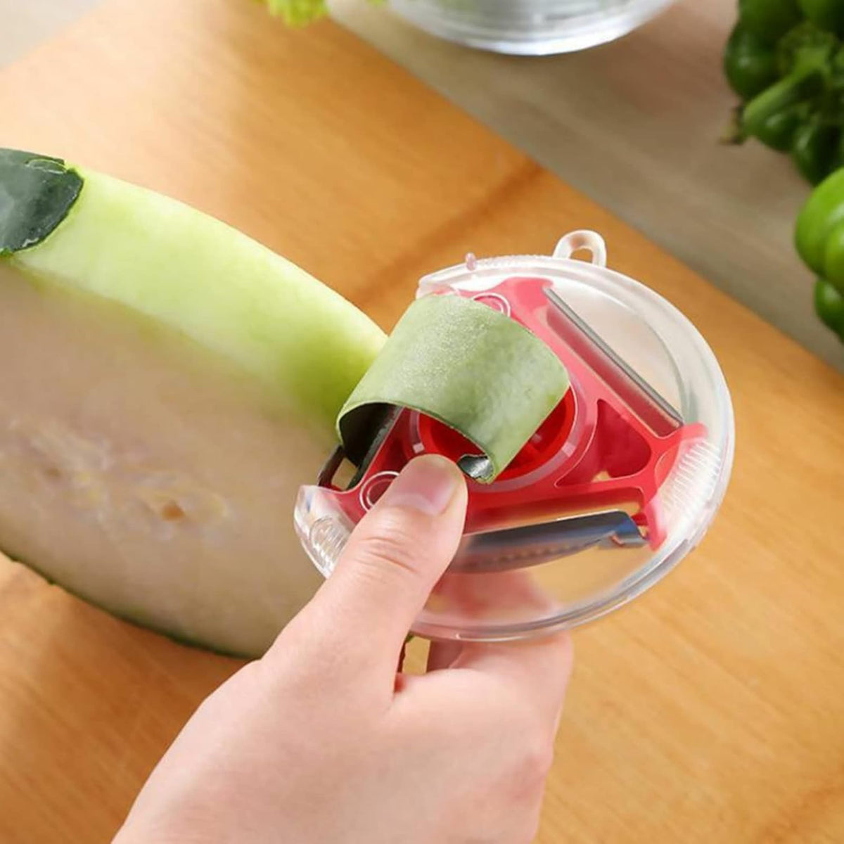 Belro 3-in-1 vegetable peeler and shredder kitchen tool with stainless steel blades on a white background.