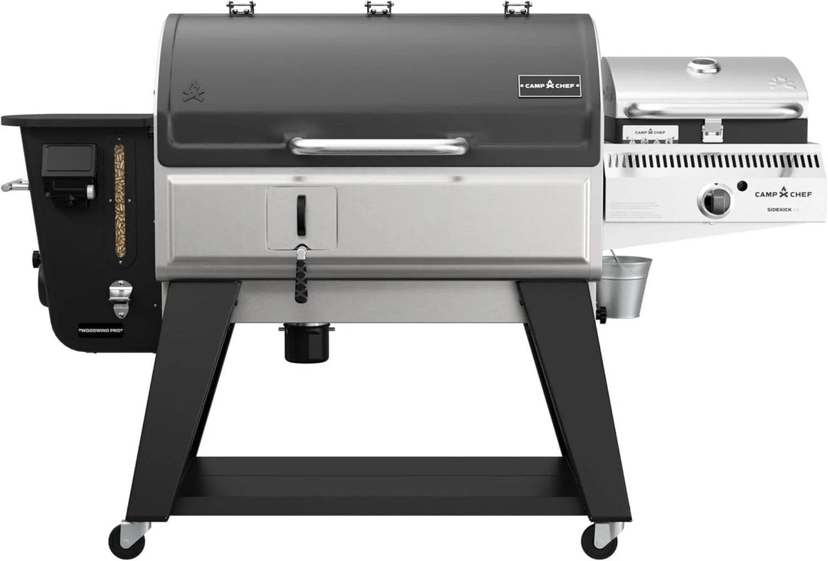 Casavibeo Camp Chef Woodwind Pro 36 Pellet Grill with stainless steel lid and digital control panel on a backyard patio setting