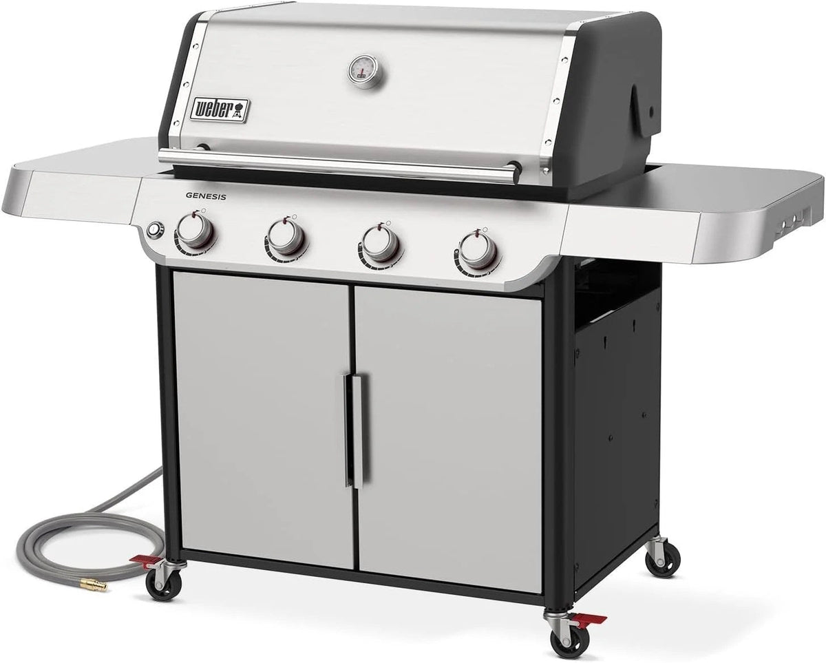 Casavibeo Weber Genesis S-415 natural gas grill with four burners, stainless steel lid, side shelves, and control panel.