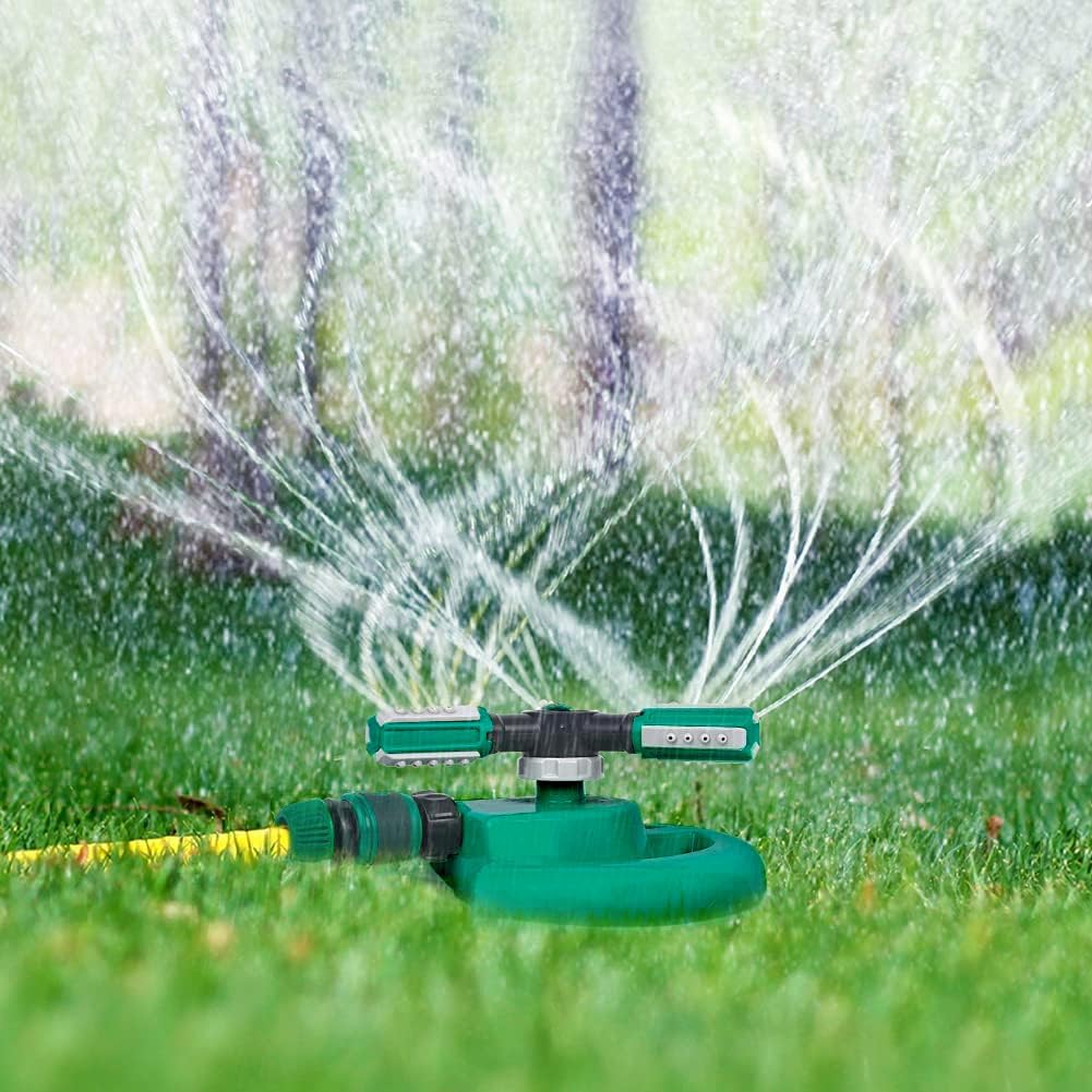 Belro garden lawn water sprinkler watering a grassy outdoor area in a home garden setting.