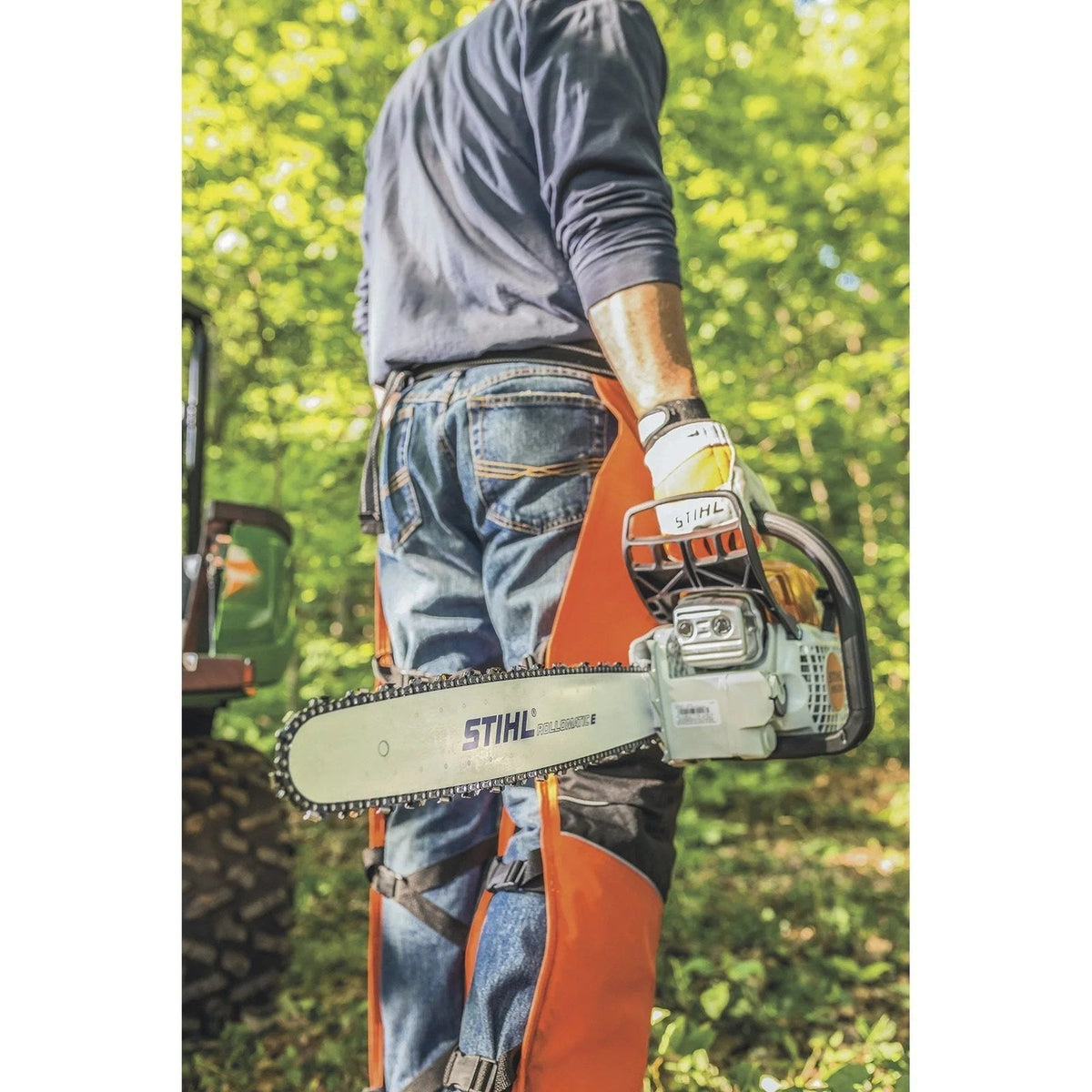 Stihl gas-powered chainsaw with a 20-inch bar, 55.5cc engine, and 0.325-inch chain pitch for cutting wood.