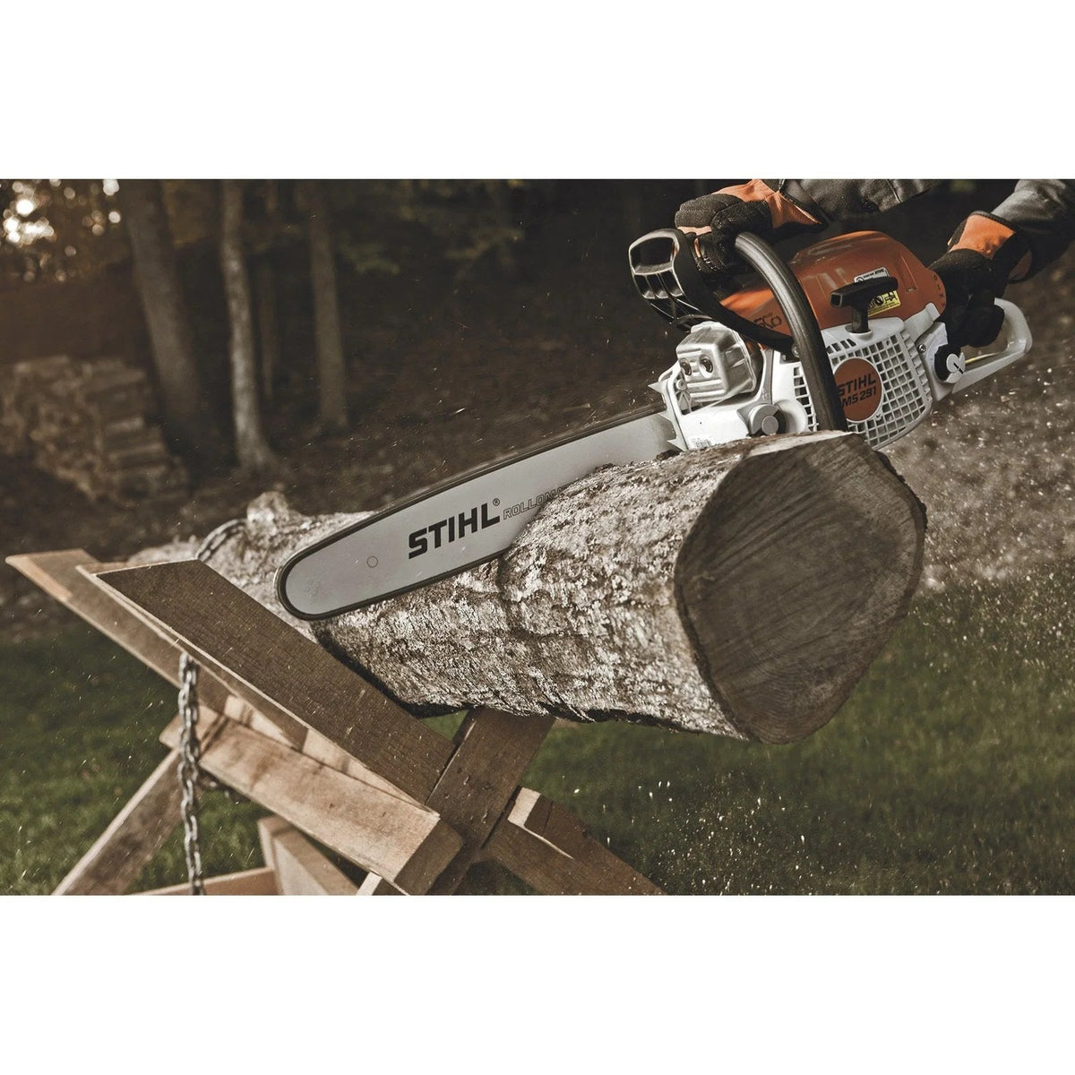 Stihl gas-powered chainsaw with 20-inch bar, 55.5cc engine and 0.325-inch chain pitch, model MS 291 20, on a workbench.