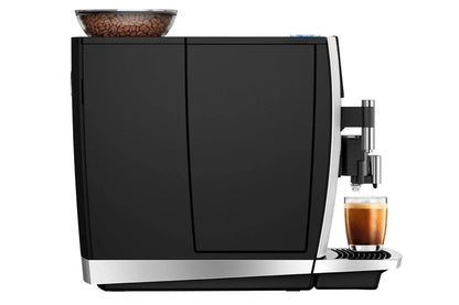 Casavibeo Jura GIGA 6 automatic coffee machine with sleek design, multiple coffee spouts, and digital control panel.