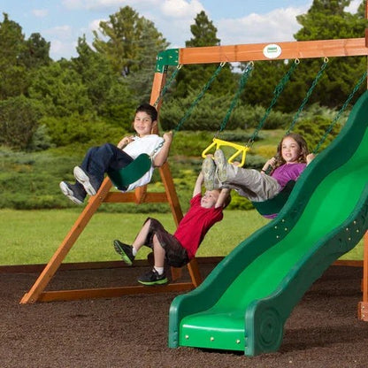 Casavibeo Shenandoah cedar wood swing set with slide in backyard, featuring a sturdy ladder, climbing wall, and colorful slide for kids.