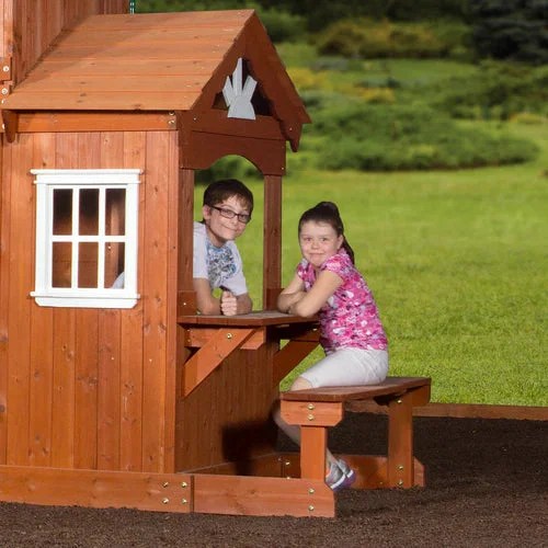 Casavibeo Shenandoah cedar wood swing set with a colorful slide and climbing features in a backyard setting.