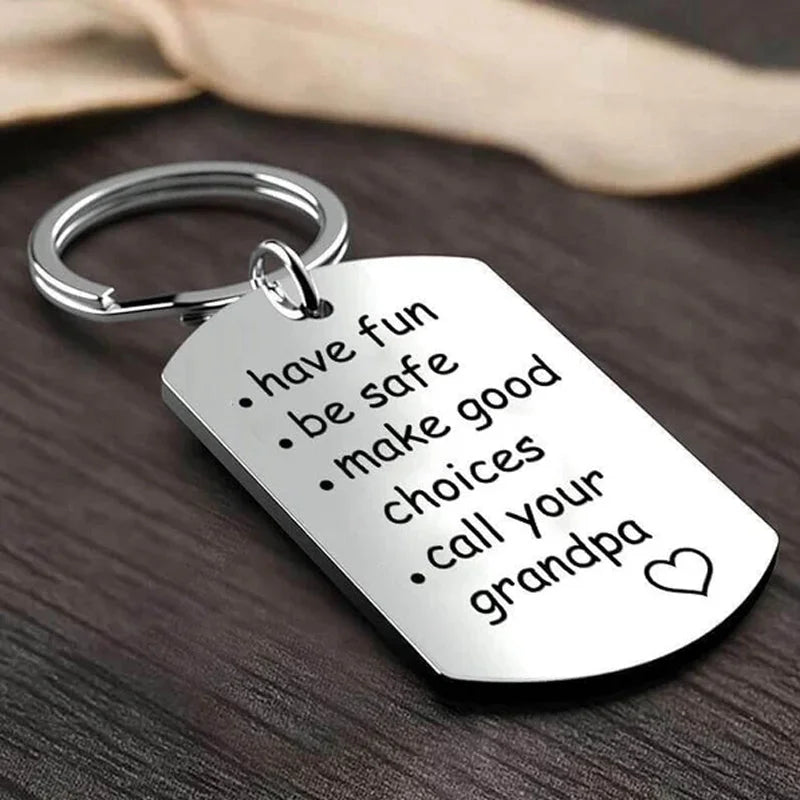 Belro stainless steel keychain with engraved reminder message, designed as a durable accessory for keys and daily organization.
