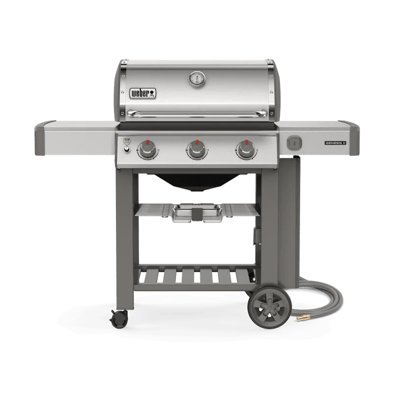 Casavibeo Weber Genesis II S-310 gas grill with stainless steel lid, side shelves, and four main burners for outdoor cooking.
