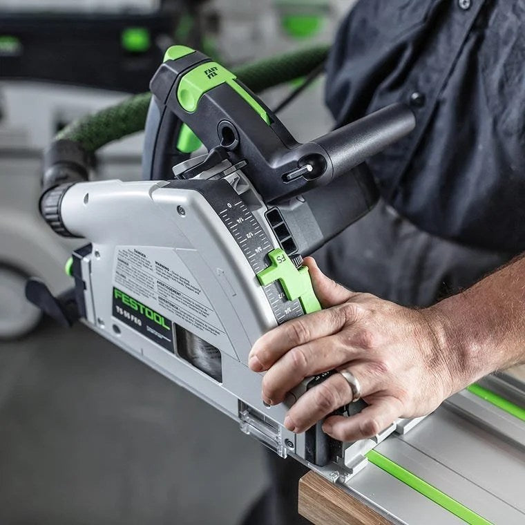 Casavibeo plunge saw Festool TS 55 1200W with guide rail, showing the saw blade and ergonomic handle in a workshop setting.