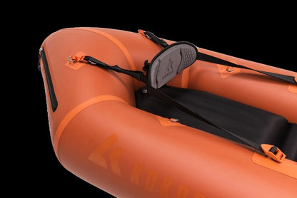 Casavibeo Recon inflatable kayak shown on water, featuring durable material and compact design for easy paddling and transport.
