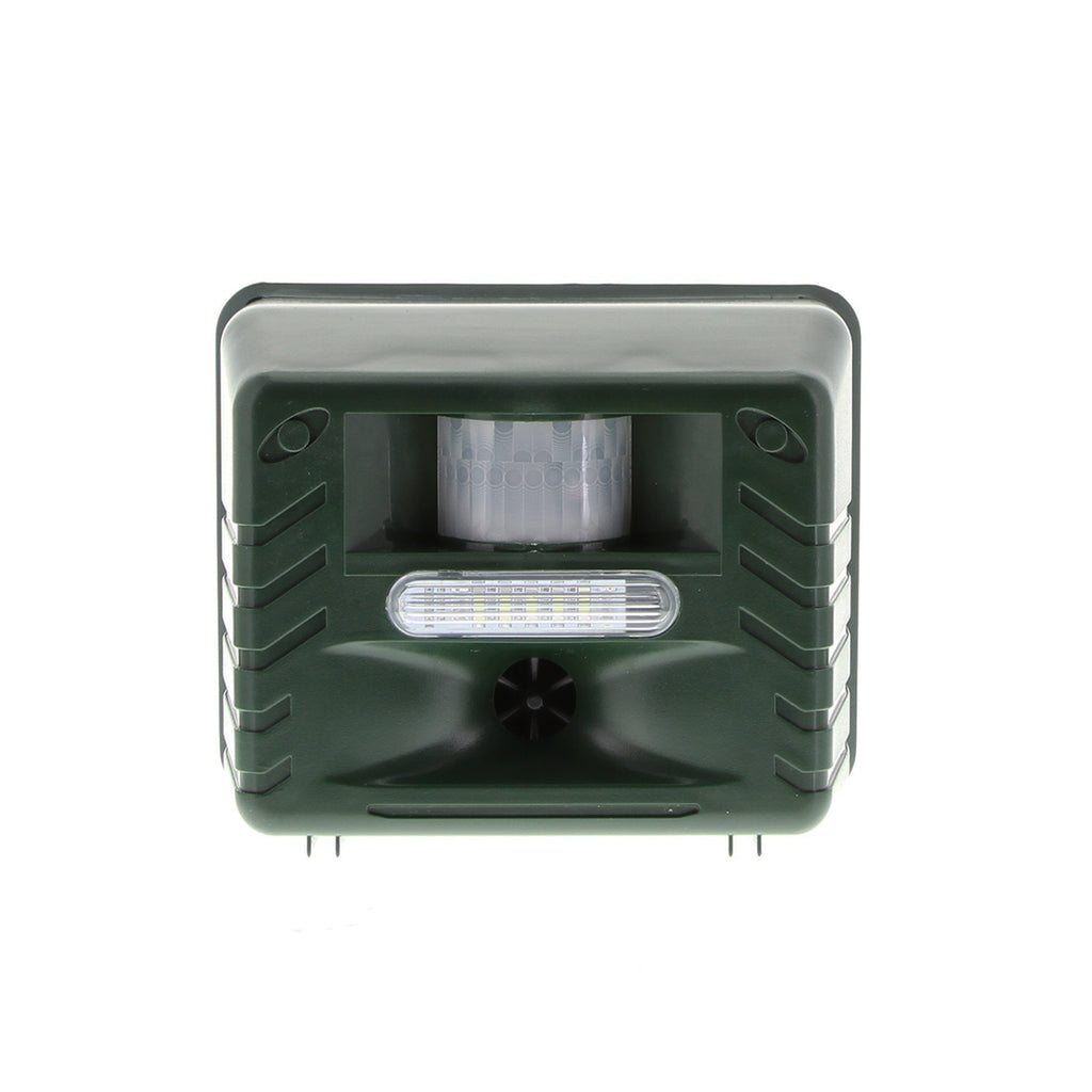 Belro ultrasonic bird repeller for woodpeckers, outdoor pest control device in garden setting, designed to deter woodpecker activity.