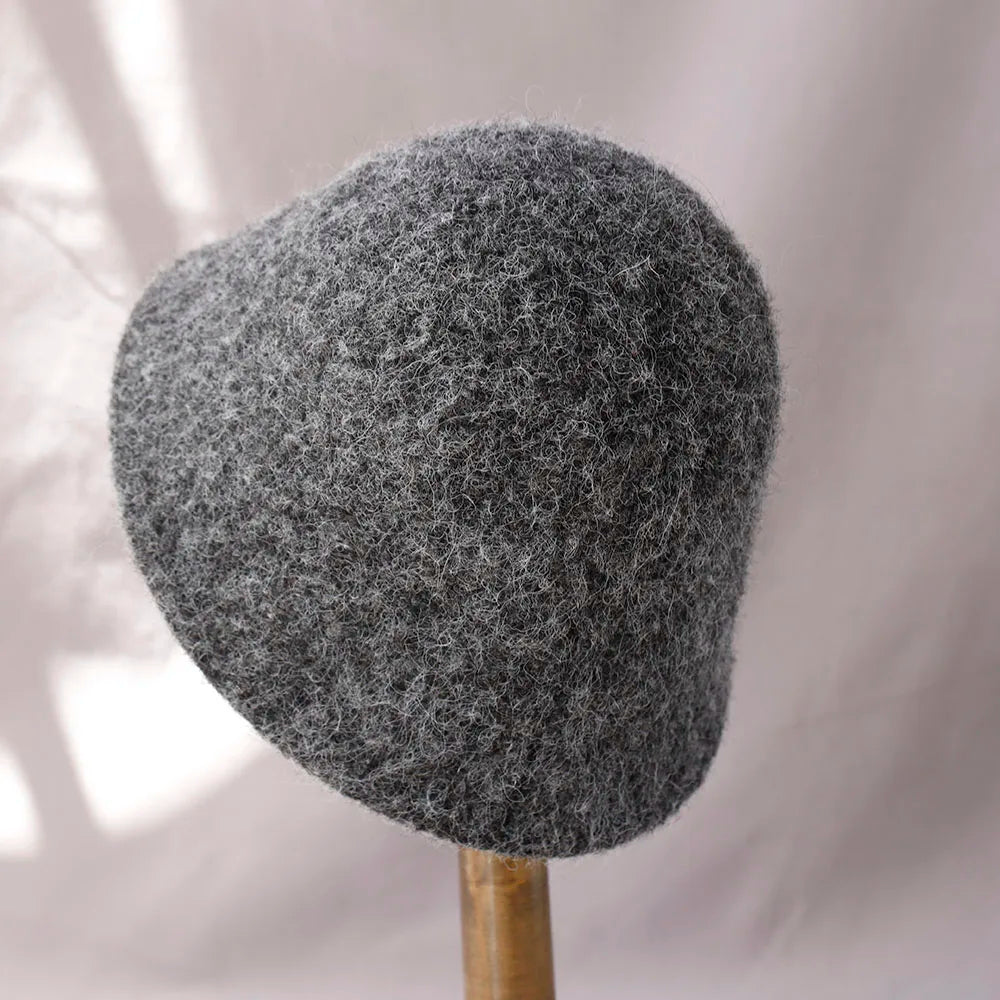Women's winter wool bucket hat by Belro, featuring a cozy, stylish design perfect for cold weather.