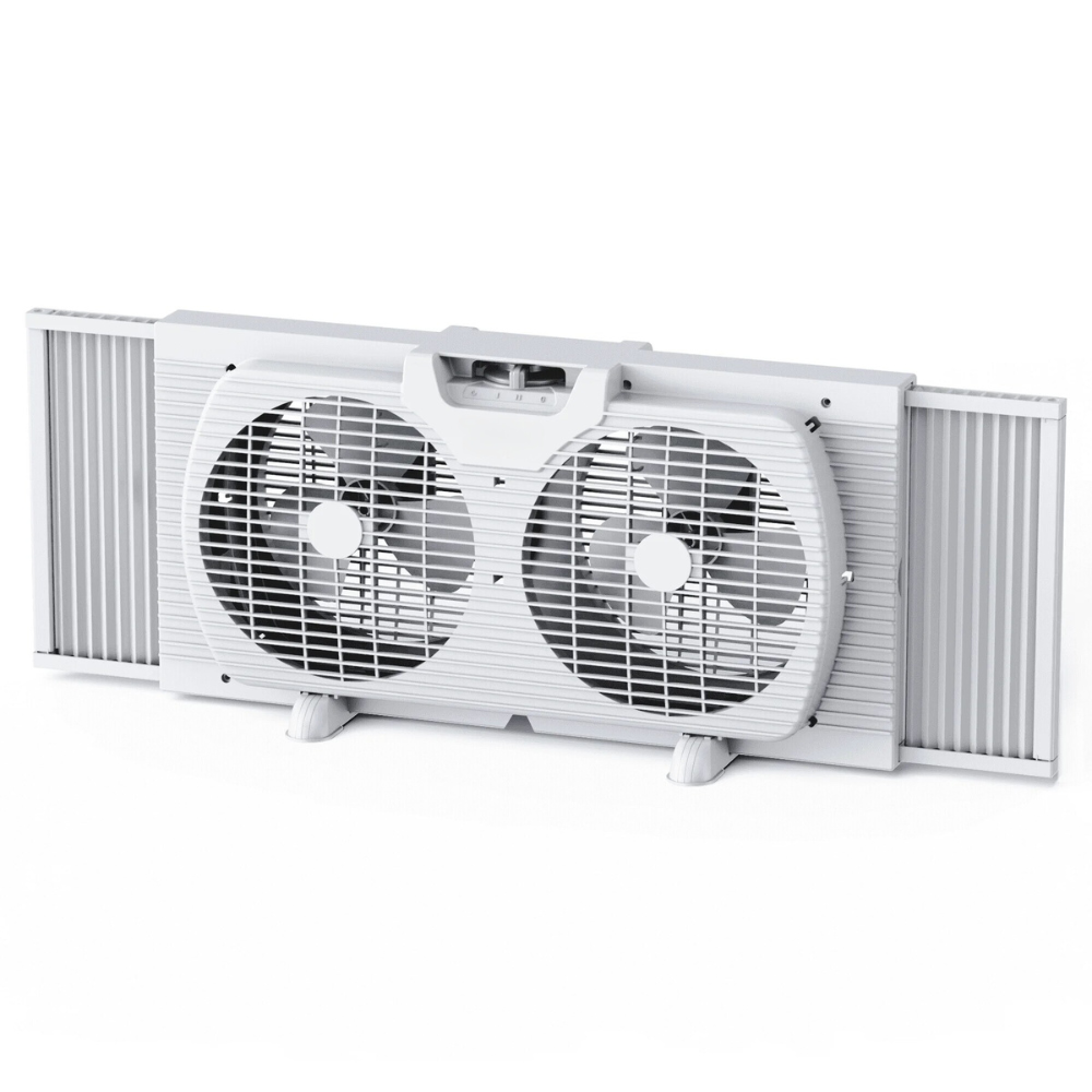 Belro InstaBreeze twin window cooling fan system installed in a home window for outdoor cooling and fresh airflow.