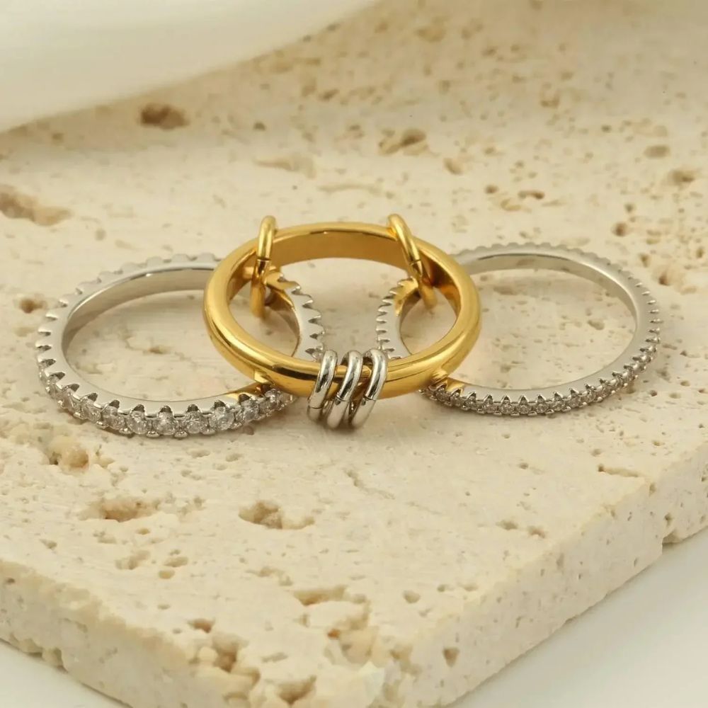 Set of six trendy gold stackable rings by Belro, showcasing layered jewelry accessories for stylish fingers.