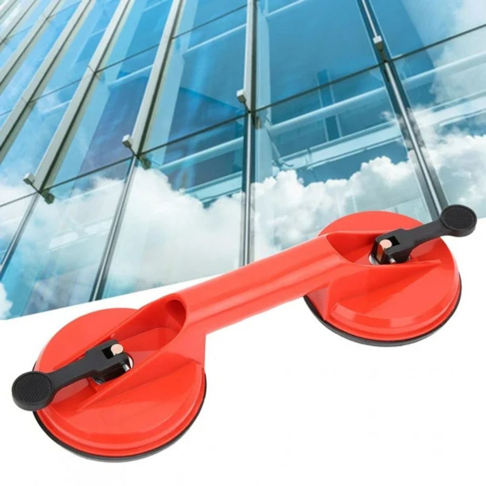 Belro dual suction glass window dent pulling suction cup attached to a window surface for dent repair.