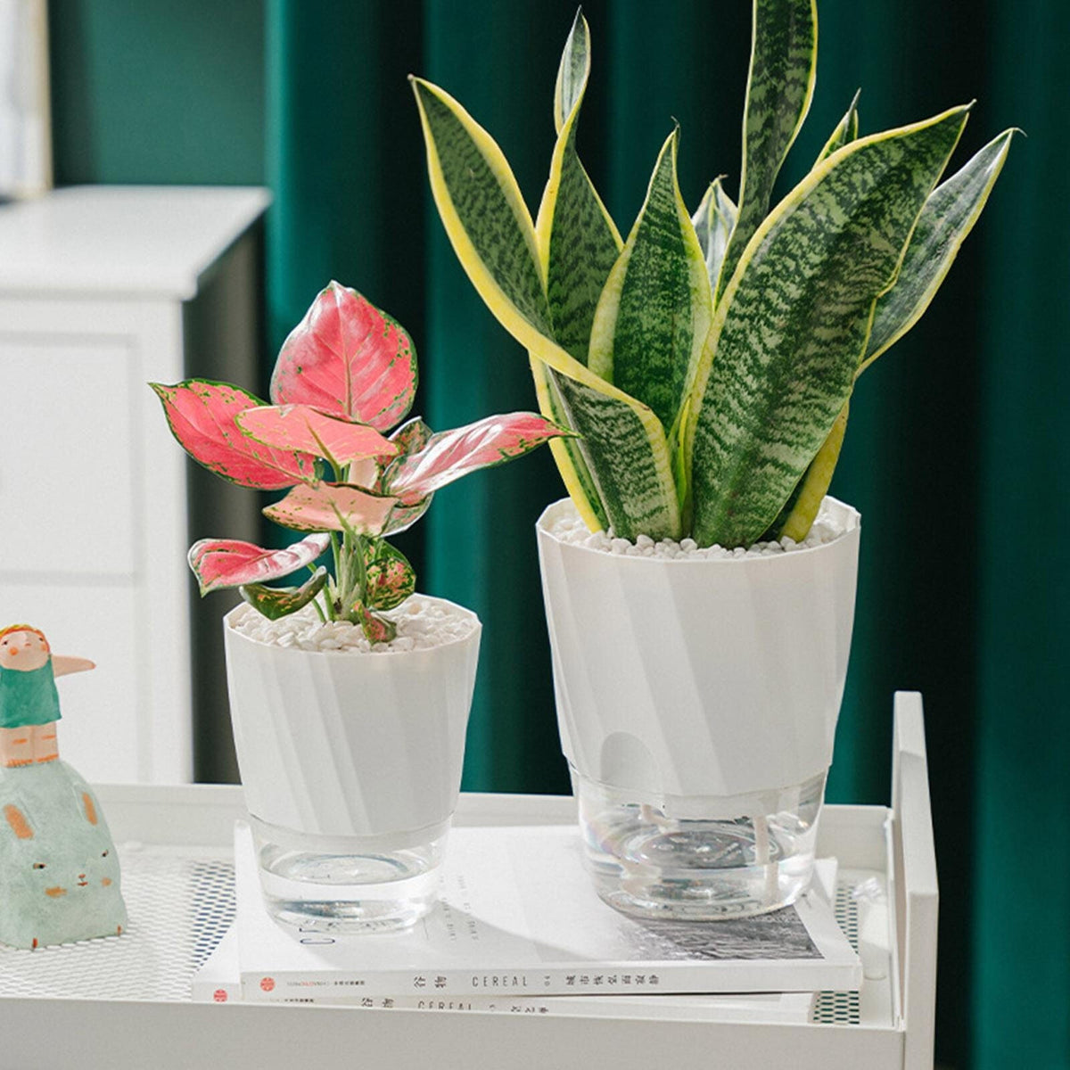 Belro self watering planter for outdoor garden, featuring a modern design with a built-in reservoir for easy plant care.