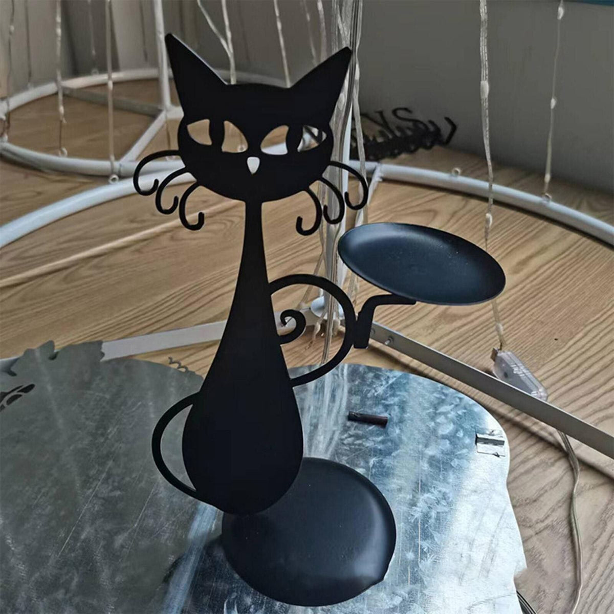 Black Cat Candle Holder by Belro, decorative black cat-shaped ceramic candle holder for home decor and ambient lighting.