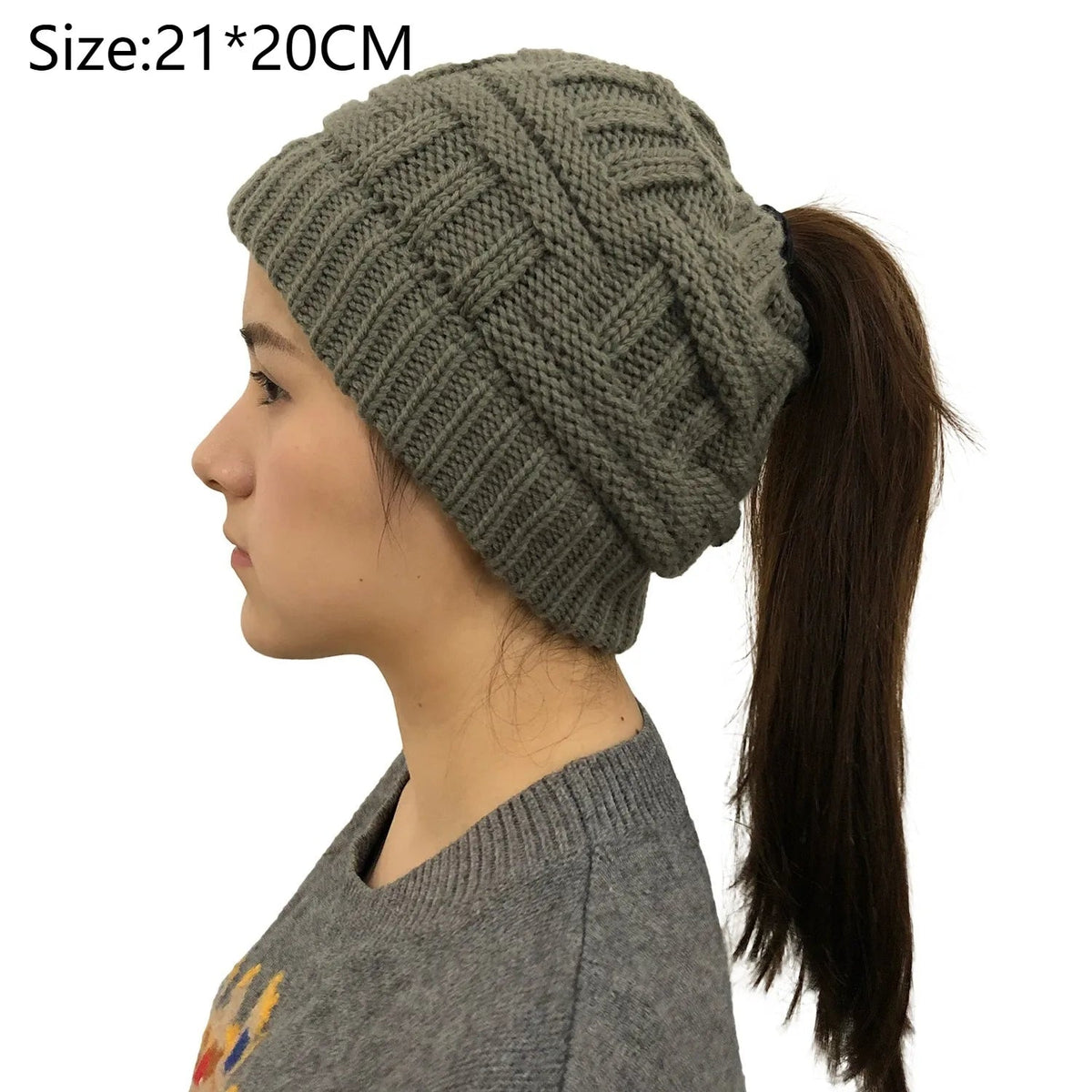Belro women’s winter knit beanie hat with a ponytail opening, cozy and stylish for cold weather, made of soft knit material.