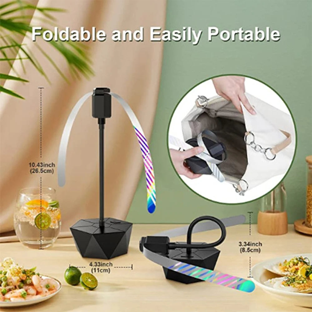 Belro outdoor fly repellent fan for home and garden pest control, showing a black fan with protective casing in an outdoor setting.