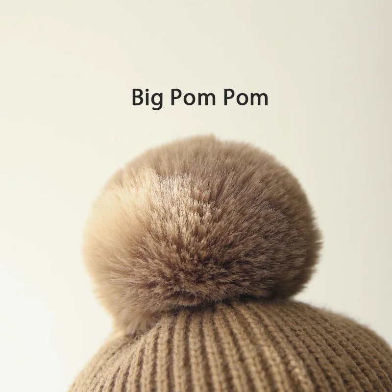 Kids knit winter beanie hat with earflaps by Belro, cozy and warm for cold weather, featuring a colorful knit pattern and earflap design.