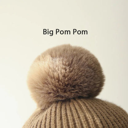 Kids knit winter beanie hat with earflaps by Belro, cozy and warm for cold weather, featuring a colorful knit pattern and earflap design.