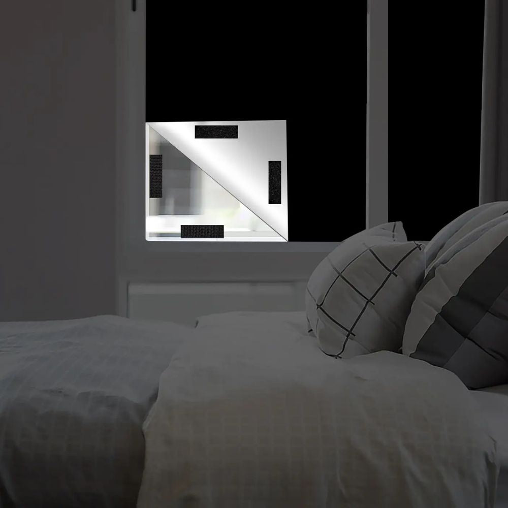 Blackout black window shade by Belro, designed to block sunlight, suitable for men's clothing window coverings.