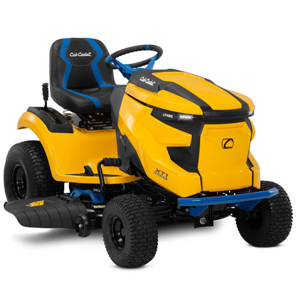 Casavibeo Cub Cadet XT1 LT42E electric lawn tractor with 42-inch cutting deck and ergonomic steering in a lush green yard.