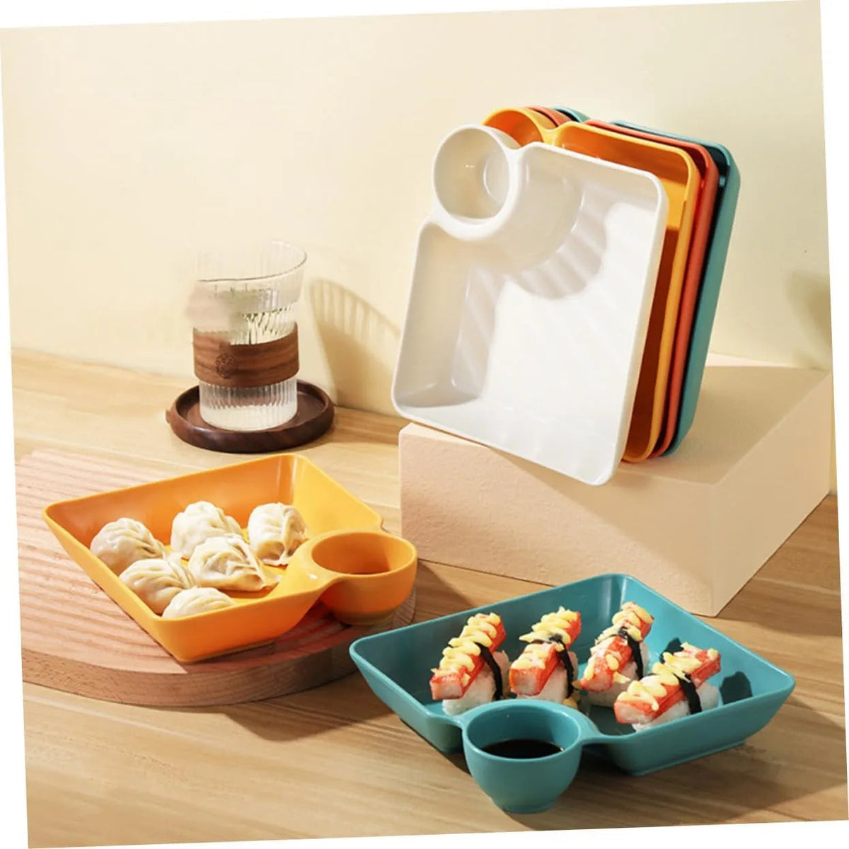 Mivoza dipping plate with sauce compartment, stackable and no-drip design, perfect for serving condiments and appetizers.