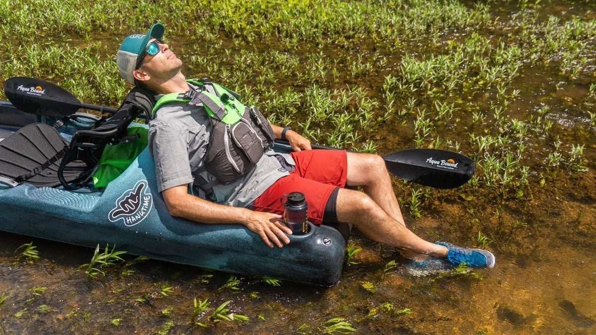 Casavibeo Perceptions Hangtime 11.0 recreational kayak on water, featuring a sleek design and comfortable seating for paddling adventures.