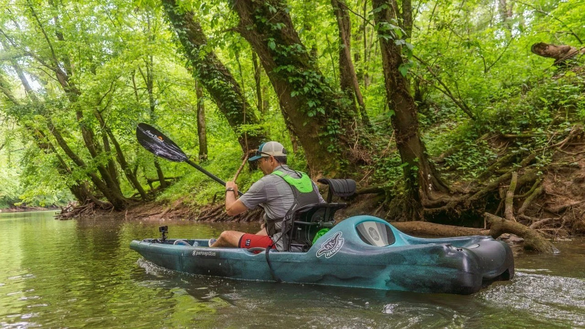 Casavibeo Perceptions Hangtime 11.0 recreational kayak on water, showing its sleek design and seating area for outdoor adventures.