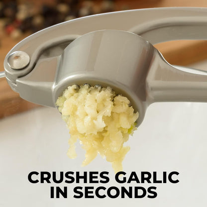 Belro Premium Garlic Press Mincer with stainless steel handles and chamber, designed for easy garlic crushing and mincing in the kitchen.
