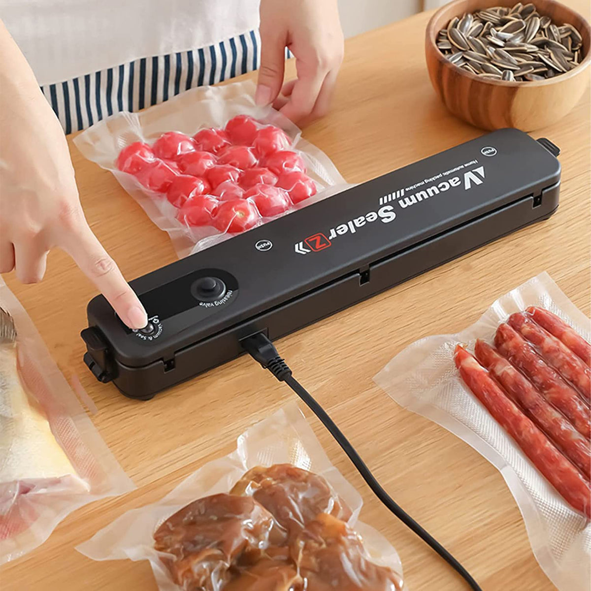 Belro electric vacuum bag sealer for kitchen food preservation, shown sealing and packing food in durable bags.