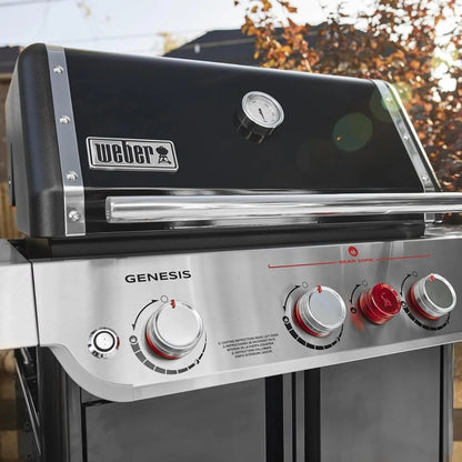 Casavibeo Weber Genesis E-325s gas grill with stainless steel lid, side shelves, and multiple burners for outdoor cooking.