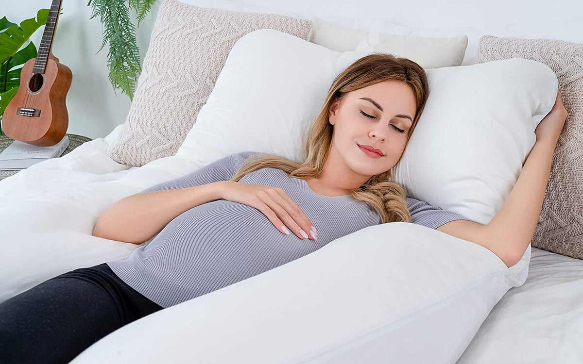 Belro U-shaped full body pregnancy maternity pillow for comfortable sleep, shown in a cozy bedroom setting.