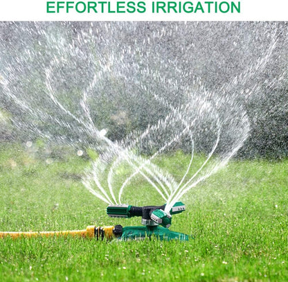 Belro garden lawn water sprinkler set up outdoors, watering a lush green grass in a home garden.