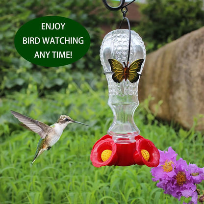 Glass hummingbird feeder with flowers design and ant moat by Belro, perfect for garden decor and attracting hummingbirds.