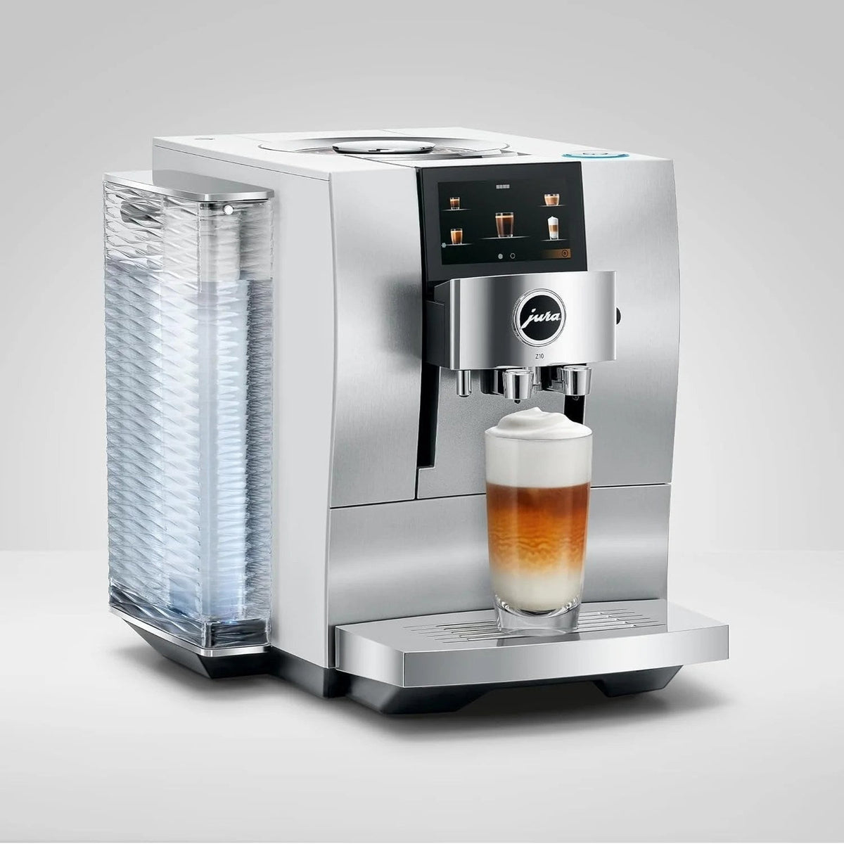 Casavibeo Jura Z10 automatic coffee machine with sleek design, digital display, and multiple beverage options on a white countertop.