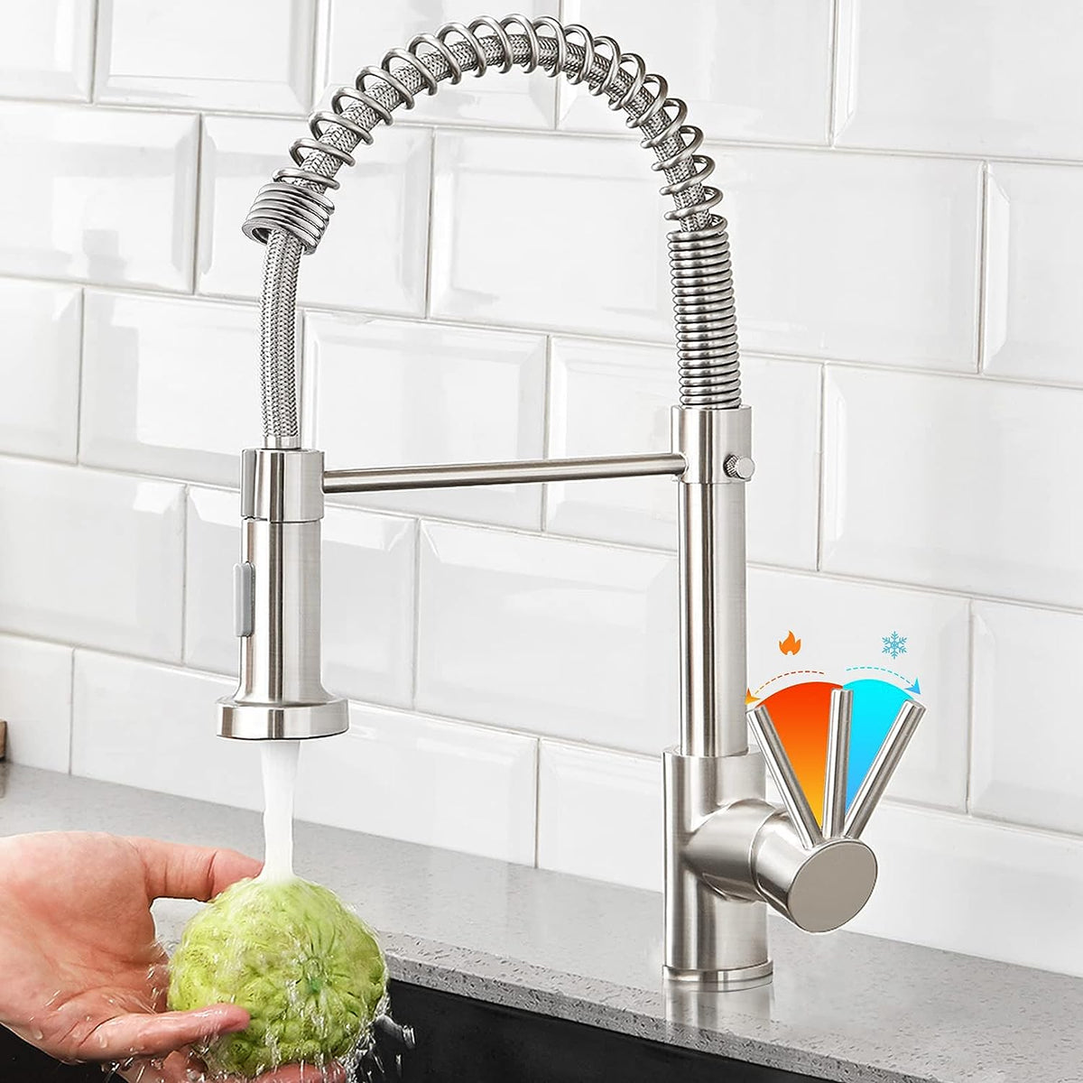 Belro single-handle kitchen faucet with pull-down sprayer, stainless steel finish, mounted on a kitchen sink.