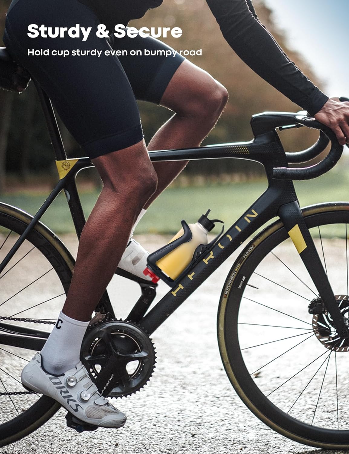 Belro bike bottle holder attached to men's cycling jersey, lightweight and durable accessory for easy hydration during rides.