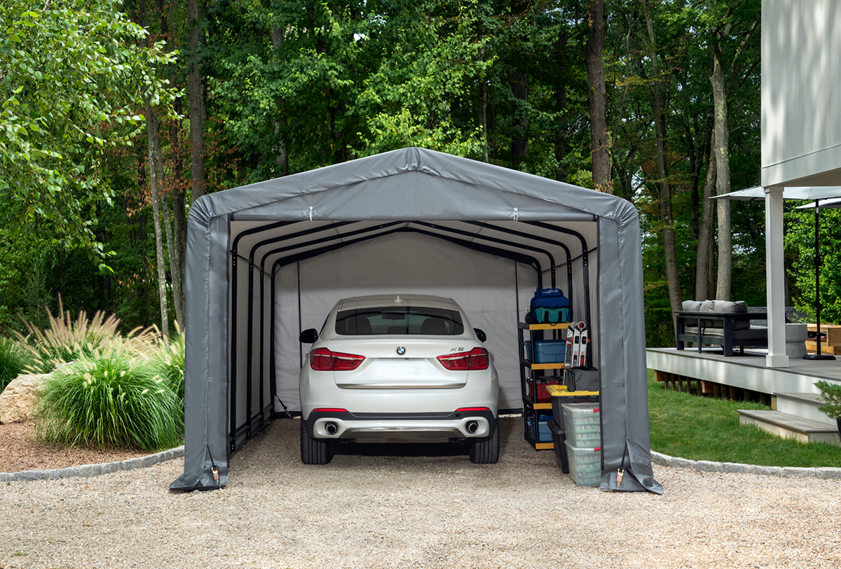 Tan ShelterTube garage shelter with 10x14x8 feet size, wind and snow load rated, by Casavibeo, shown in the image.