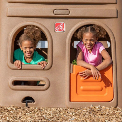 Casavibeo Step2 Naturally Playful Playhouse Climber and Swing Extension showing a colorful plastic playhouse with a slide and swing attachments
