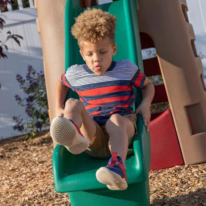 Casavibeo Step2 Naturally Playful Playhouse Climber and Swing Extension showing a colorful outdoor playset with a slide and climbing features.