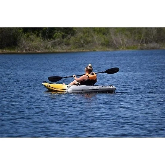Casavibeo Evoke Navigator 120 sit-on fishing kayak shown on water with paddle and fishing gear, designed for stability and outdoor adventure.