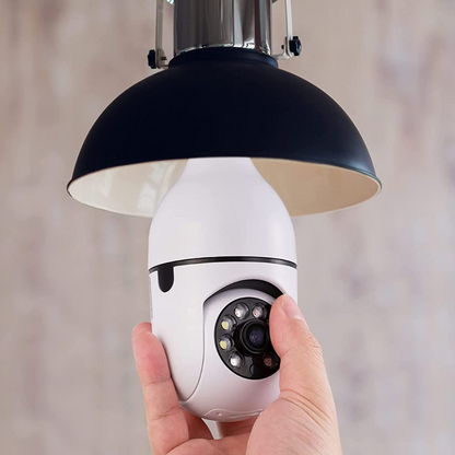 Belro Smart WiFi indoor/outdoor light bulb security camera installed in a home exterior, showing its compact design and lens.