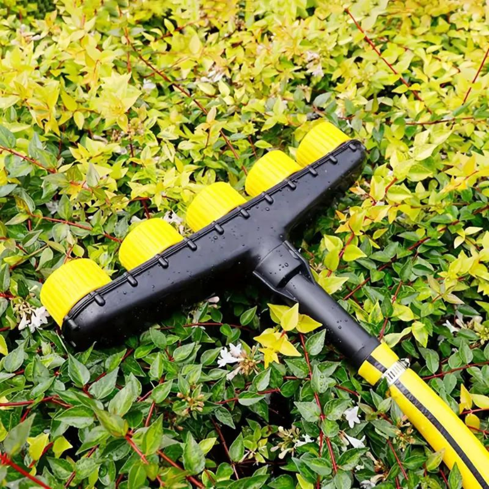Belro multipurpose garden atomizer nozzle attached to a garden hose, ideal for watering and outdoor garden tasks.