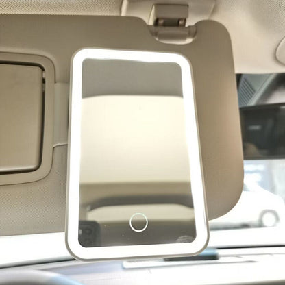 Belro LED car vanity mirror attachment mounted on a vehicle mirror, illuminated for easy makeup or grooming on the go.
