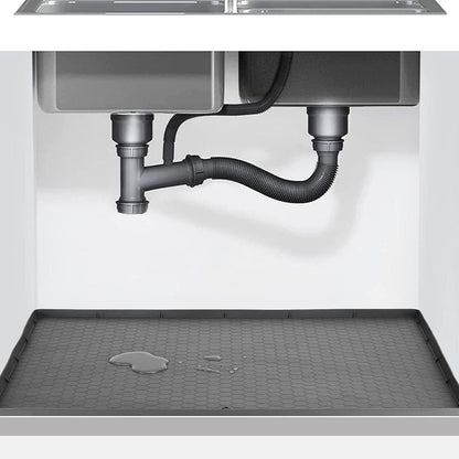 Large silicone under kitchen sink mat by Belro, protective liner with textured surface for organizing and preventing leaks.