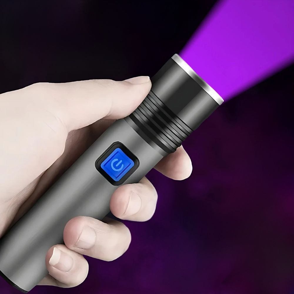 Belro handheld blacklight UV ultraviolet urine detector flashlight illuminating clothing with glowing urine stains.